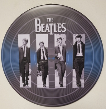 The Beatles rond relief reclamebord