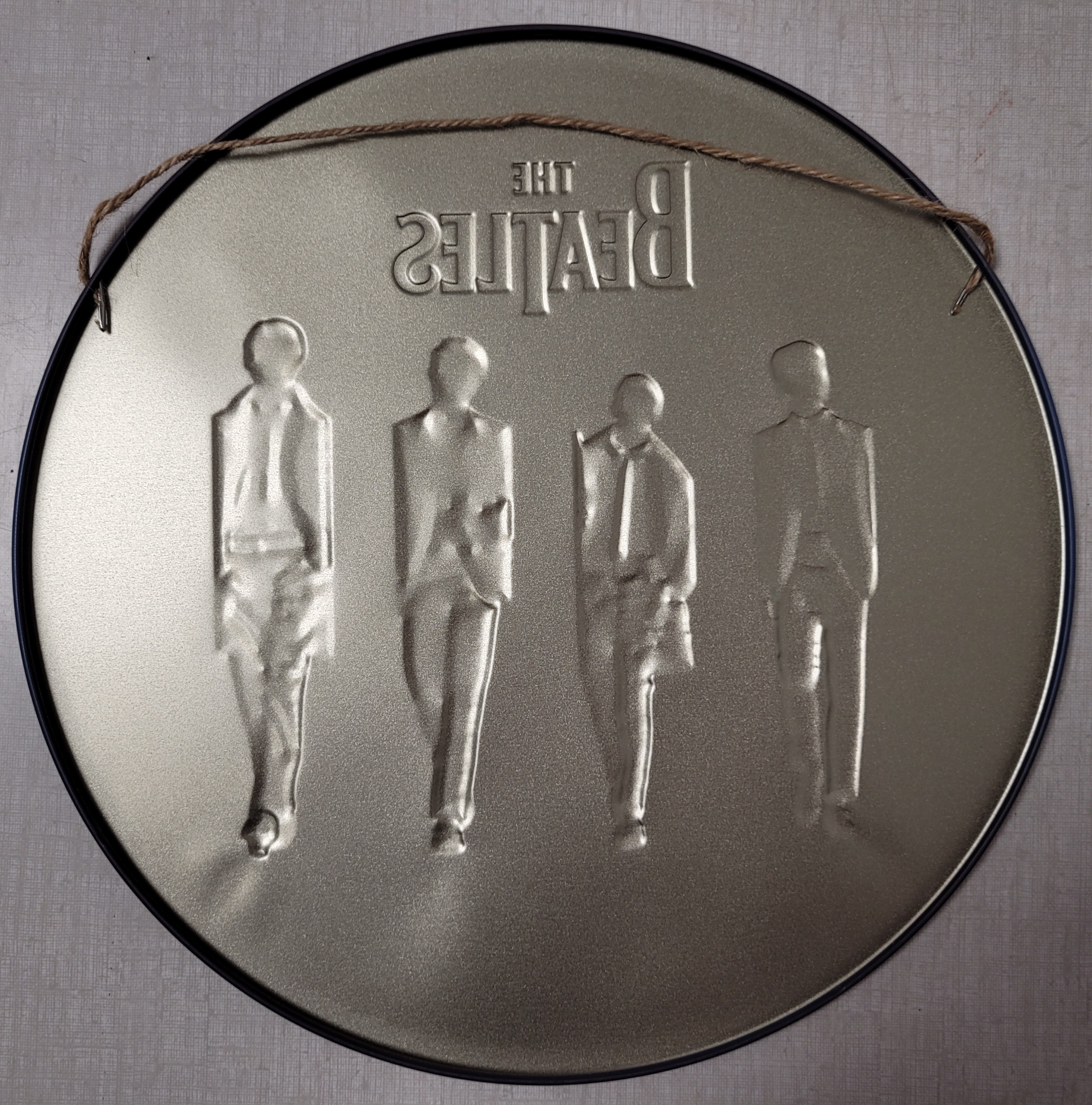 The Beatles rond reclamebord
