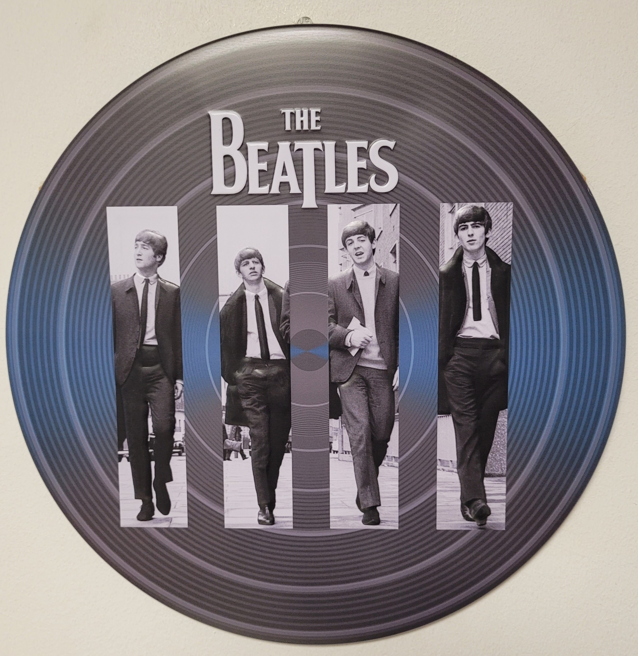 The Beatles rond reclamebord